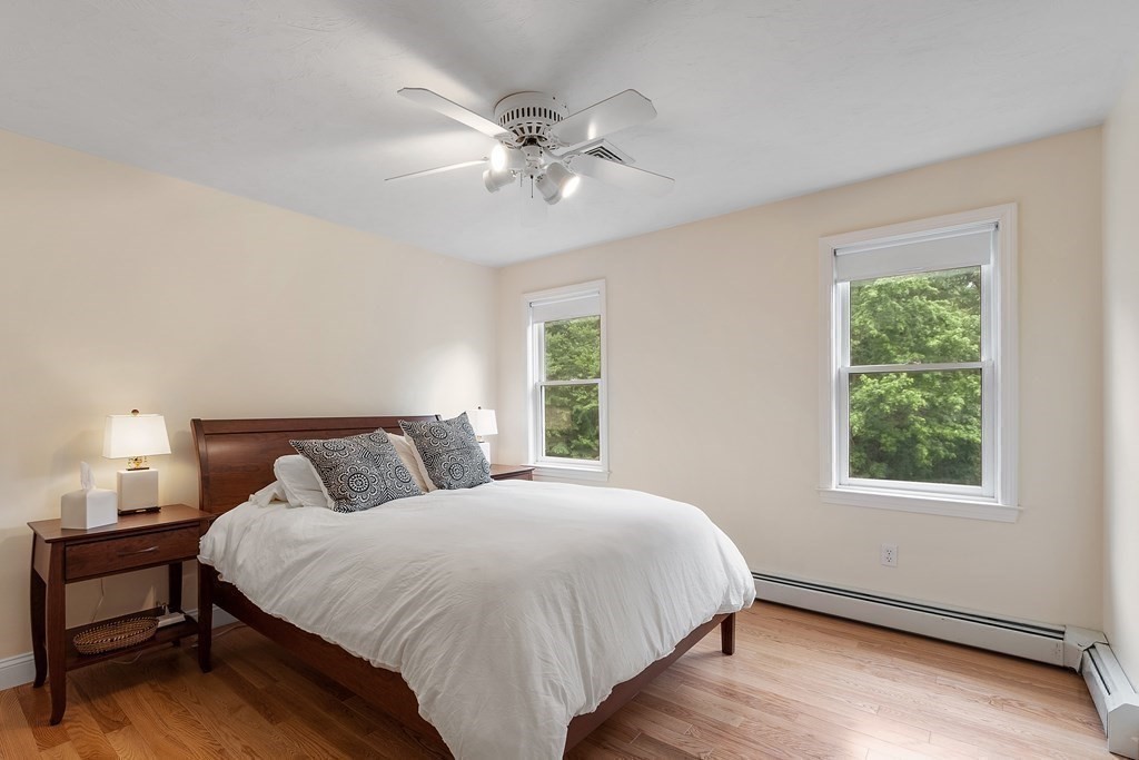 6 Farrar Road Upton, MA 01568 - Photo 21 of 42 a large bed sitting in a bedroom next to a window