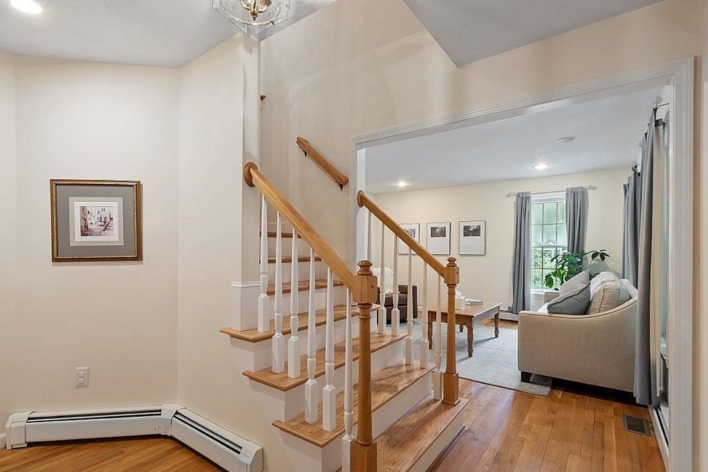 6 Farrar Road Upton, MA 01568 - Photo 3 of 42 a view of entryway and hall with wooden floor