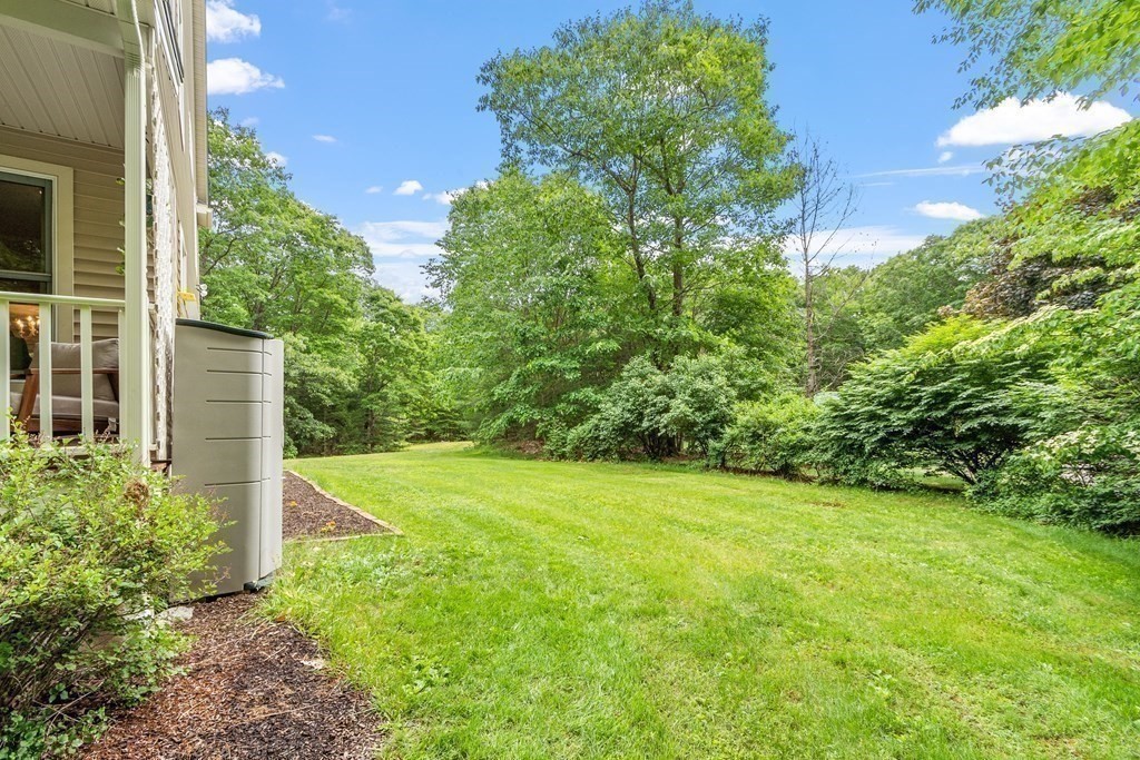 6 Farrar Road Upton, MA 01568 - Photo 34 of 42 a view of a field with plants and large trees