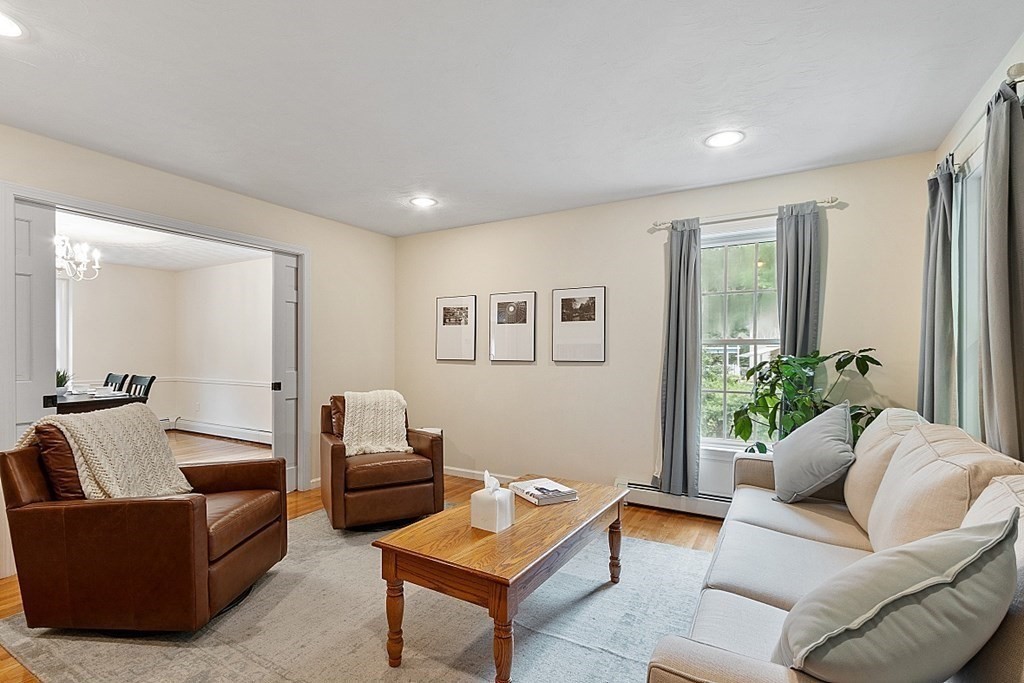 6 Farrar Road Upton, MA 01568 - Photo 4 of 42 a living room with furniture and a potted plant