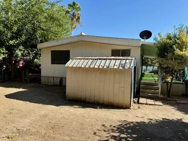 a view of city street with a house