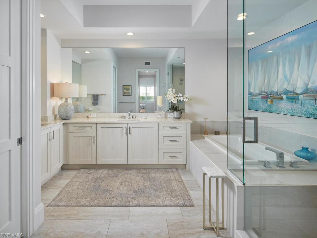 1135 3rd Avenue South Naples, FL 34102 - Photo 13 of 35 a large white kitchen with a sink and dishwasher