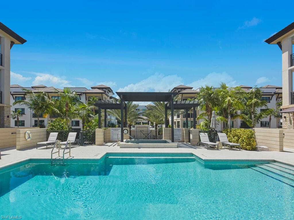 1135 3rd Avenue South Naples, FL 34102 - Photo 23 of 35 a garden view with tall trees