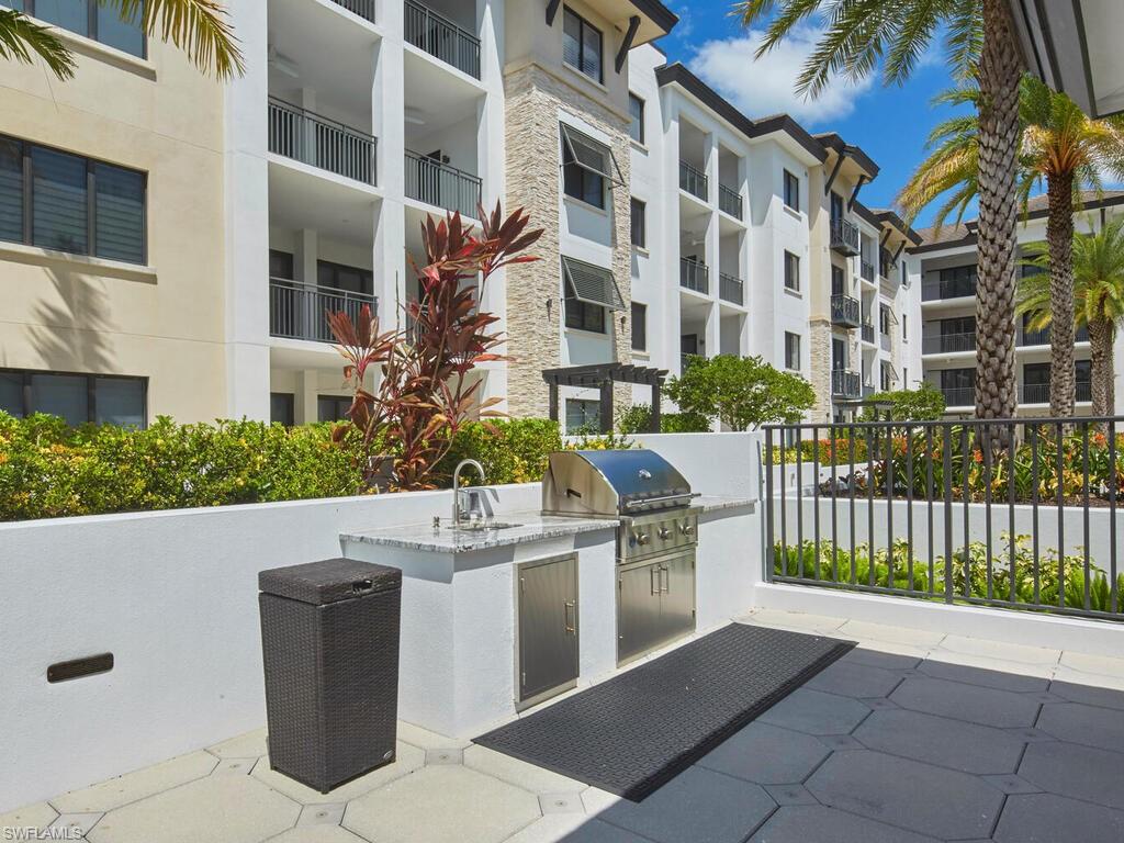 1135 3rd Avenue South Naples, FL 34102 - Photo 25 of 35 a view of a building with a outdoor space