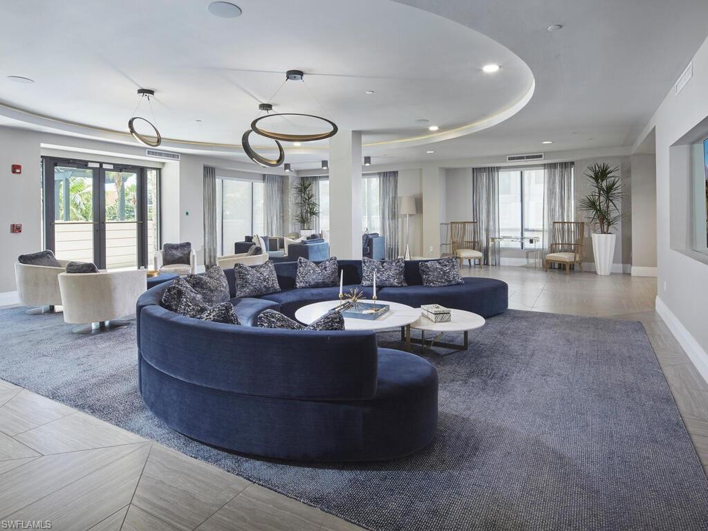 1135 3rd Avenue South Naples, FL 34102 - Photo 26 of 35 a living room with furniture and a large window