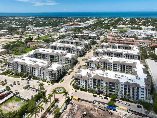 a view of city with ocean