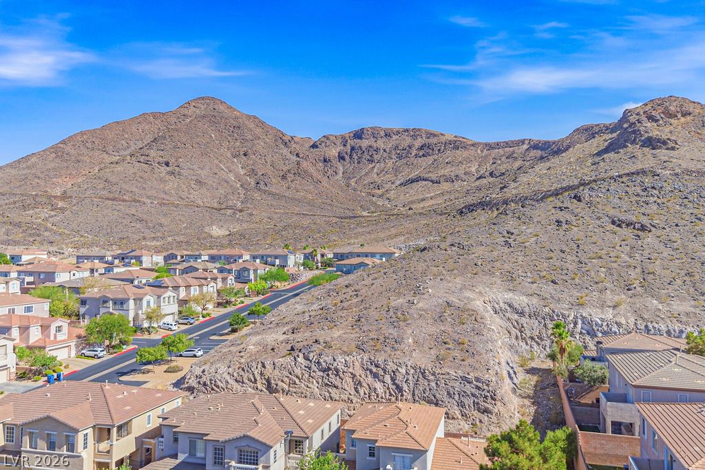 754 Solitude Point Avenue Henderson, NV 89012 - Photo 5 of 38 Perched amidst rugged mountain terrain, a community of homes enjoys sweeping desert and mountain views.