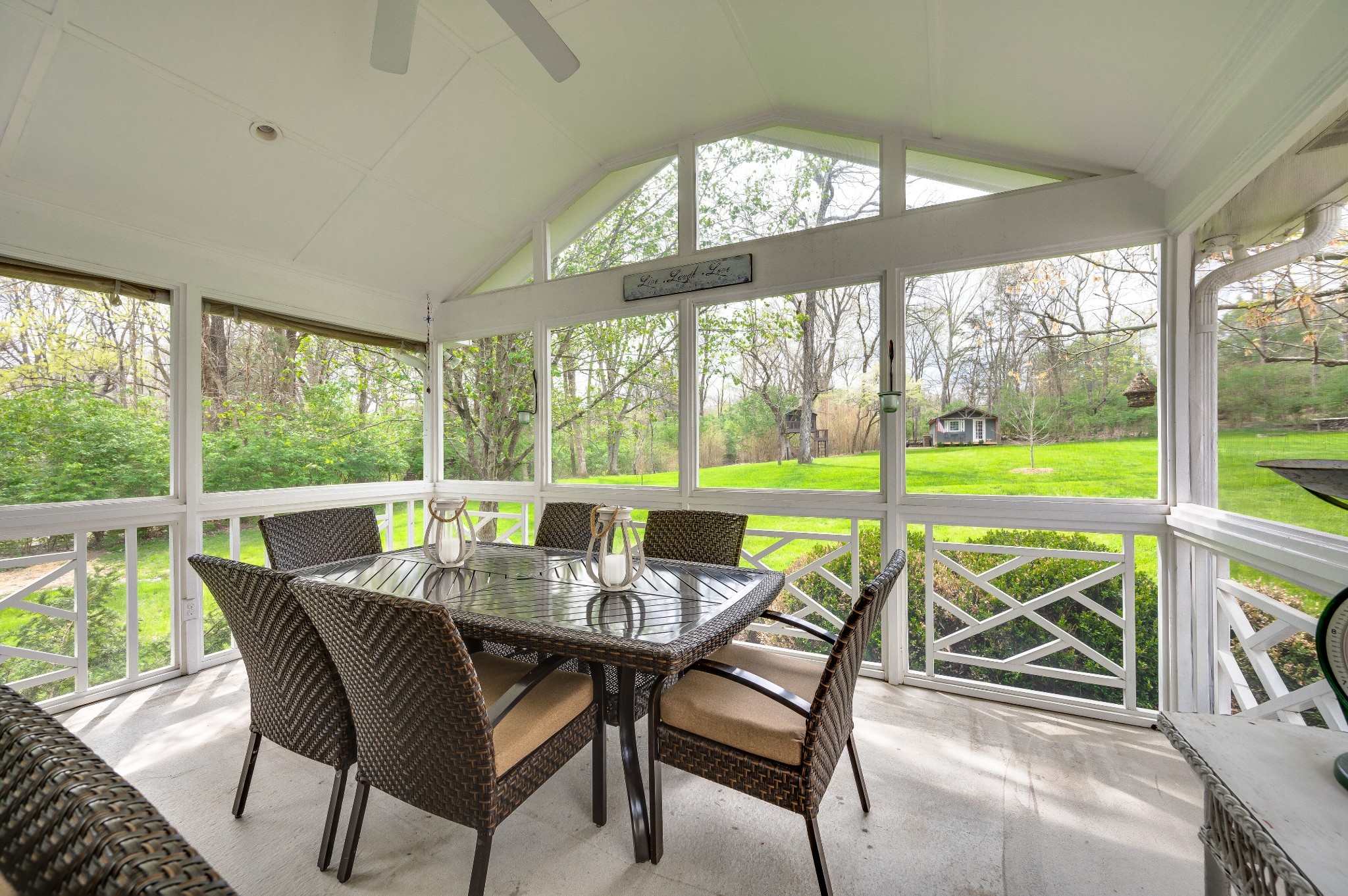 6337 Torrington Road Nashville, TN 37205 - Photo 51 of 70 a view of a city from a dining room with large windows and wooden floor