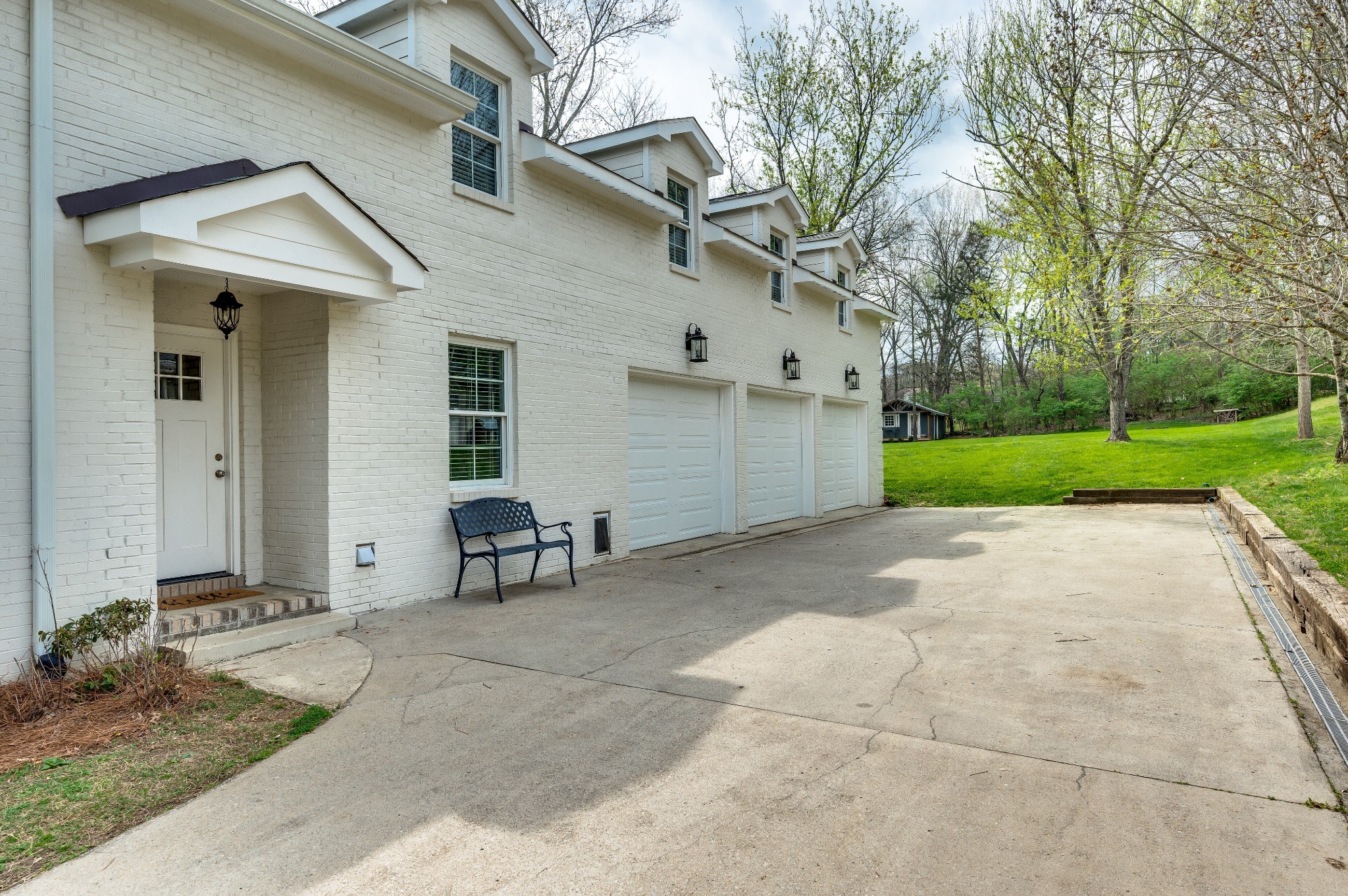 6337 Torrington Road Nashville, TN 37205 - Photo 69 of 70 a view of a house with backyard and trees