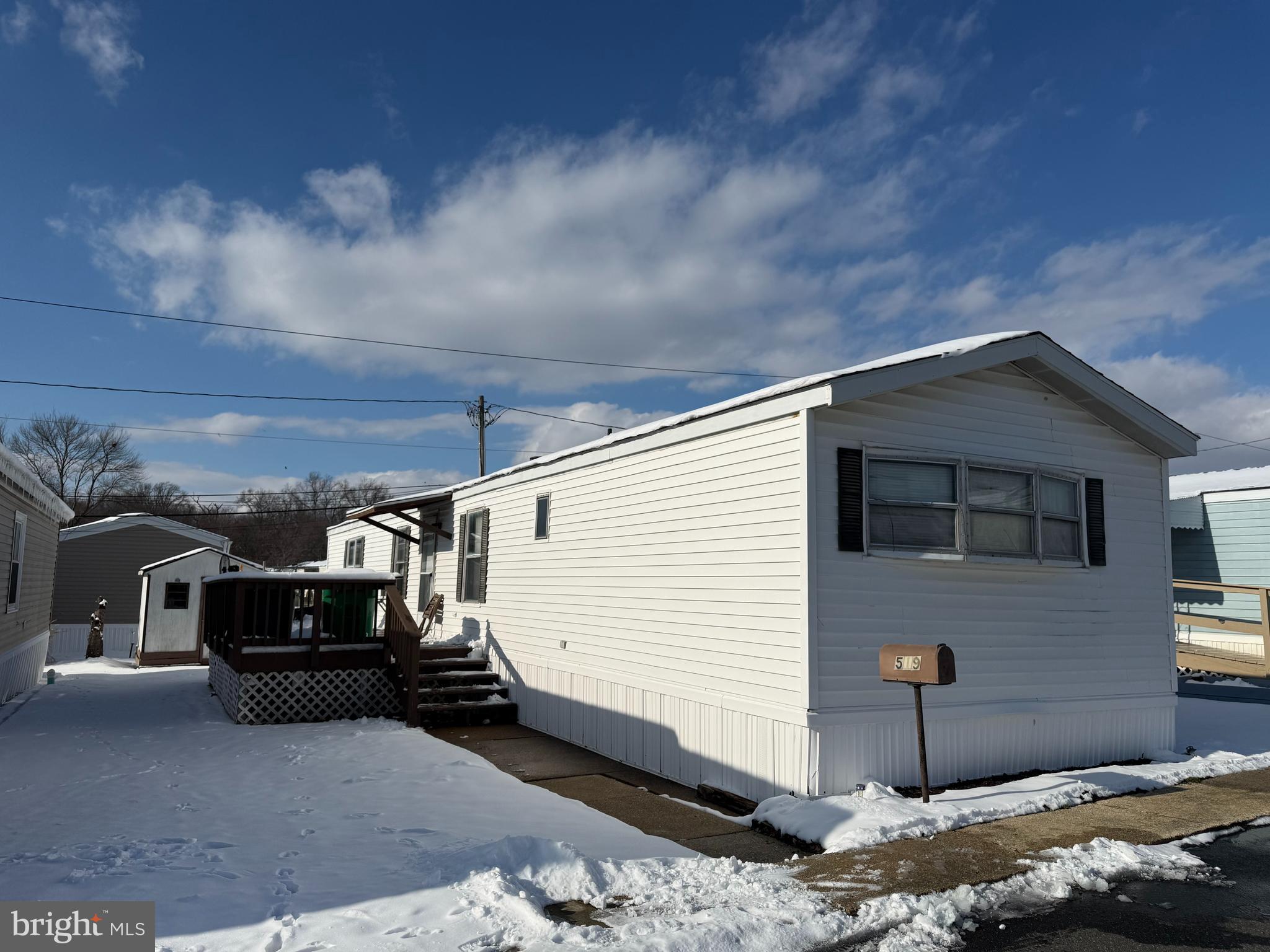 519 Canter Road, Unit 133 Wilmington, DE 19810 - Photo 1 of 14 Left side view with deck and shed