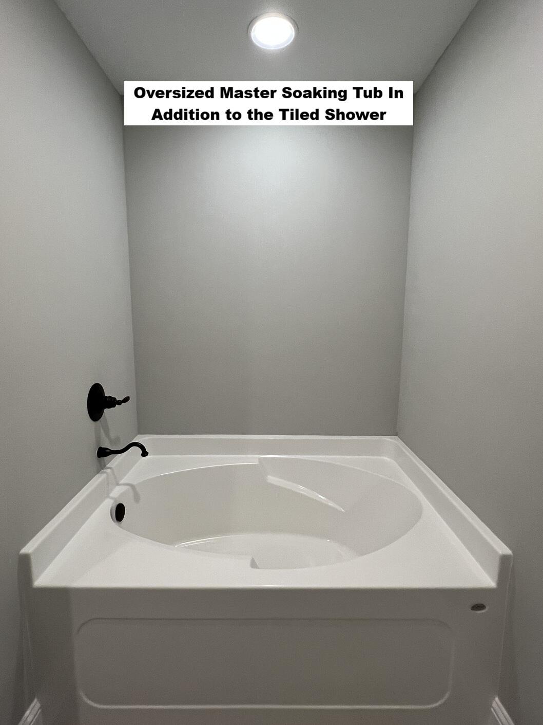 4644 Chanteuse Parkway Crestview, FL 32539 - Photo 15 of 34 a bathroom with a bathtub