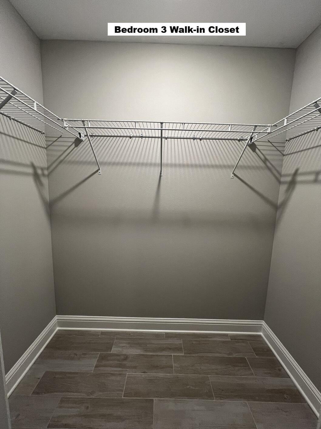 4644 Chanteuse Parkway Crestview, FL 32539 - Photo 21 of 34 a view of a room with racks on the wall