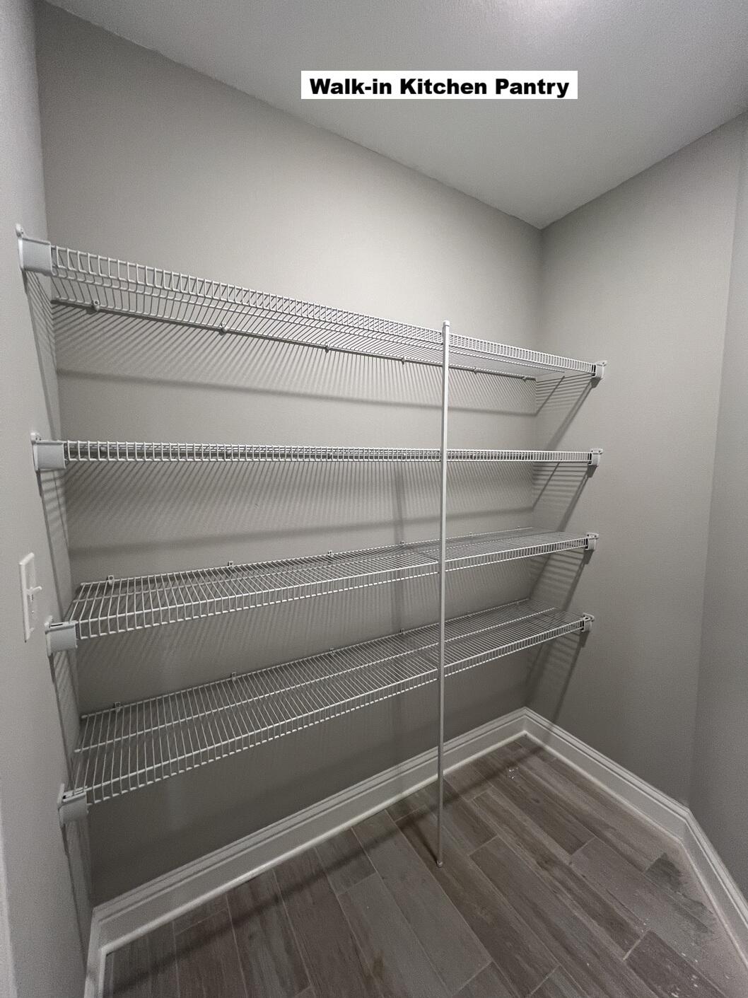 4644 Chanteuse Parkway Crestview, FL 32539 - Photo 6 of 34 a view of a room with racks on the wall