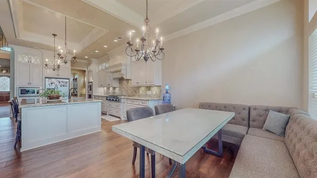a view of a dining room kitchen and a window