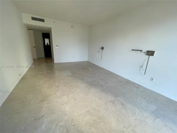 a view of a room with an empty space