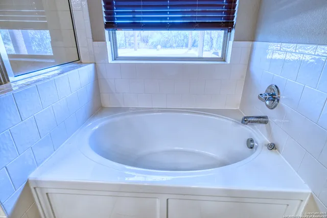 a bathroom with a bathtub