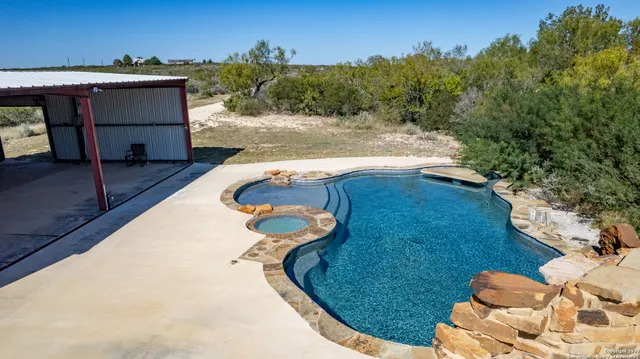 a view of a small yard in front of the house