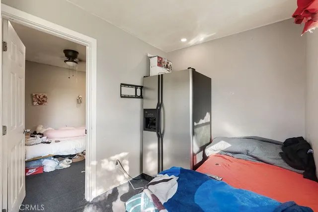 a room with furniture and a wooden floor