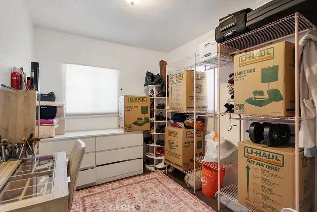 a utility room with multiple dryer and washer