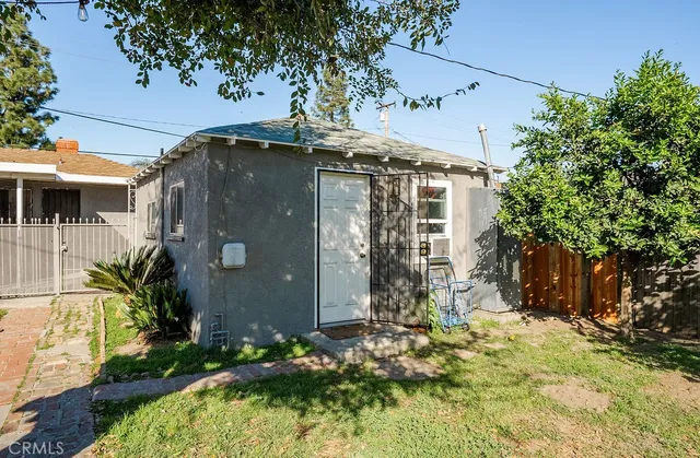 a bathroom with a shower and toilet