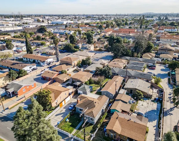 an aerial view of a city with houses