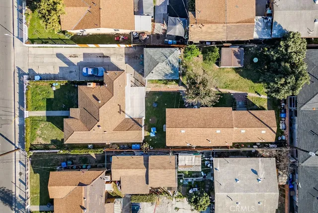 an aerial view of a city with lots of residential buildings