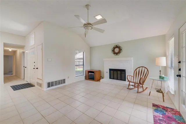 a view of livingroom with furniture and fireplace