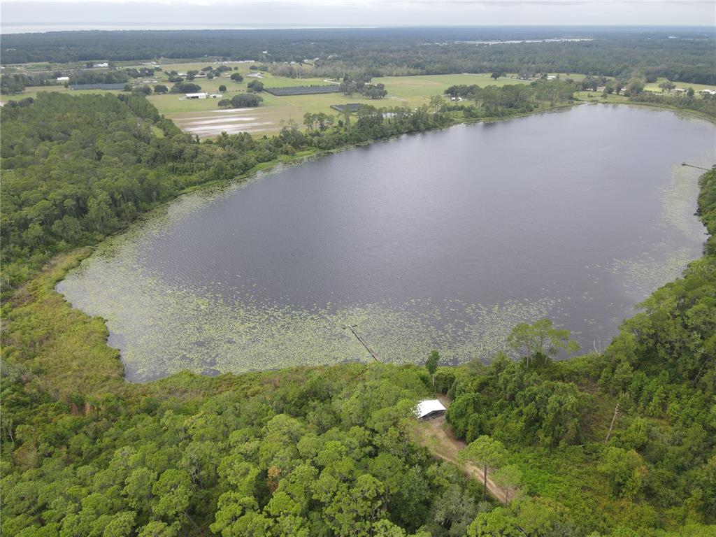 Turkey Shoot Road Pierson, FL 32180 - Photo 5 of 5 a view of a lake with a mountain