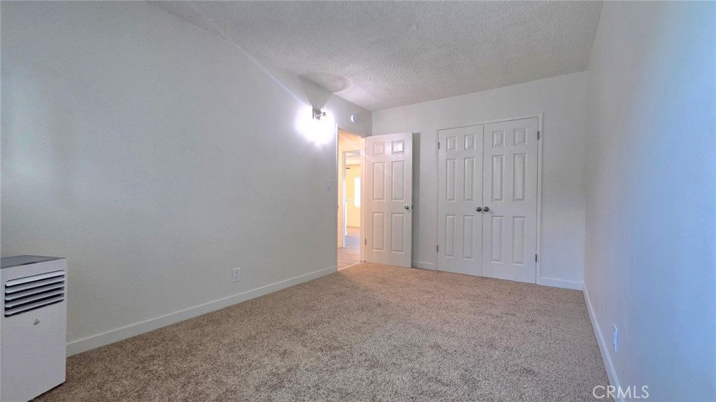 1803 West Sumac Lane, Unit 5 Anaheim, CA 92804 - Photo 10 of 18 a view of an empty room