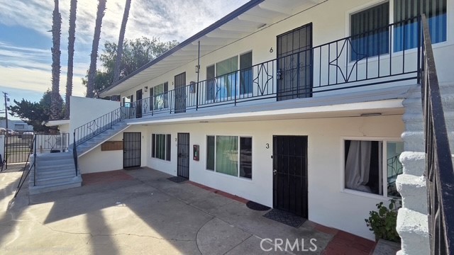1803 West Sumac Lane, Unit 5 Anaheim, CA 92804 - Photo 15 of 18 a view of a large building with many windows
