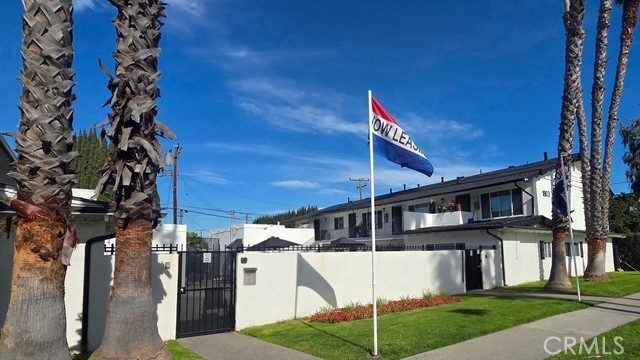 1803 West Sumac Lane, Unit 5 Anaheim, CA 92804 - Photo 16 of 18 a view of a house with a yard