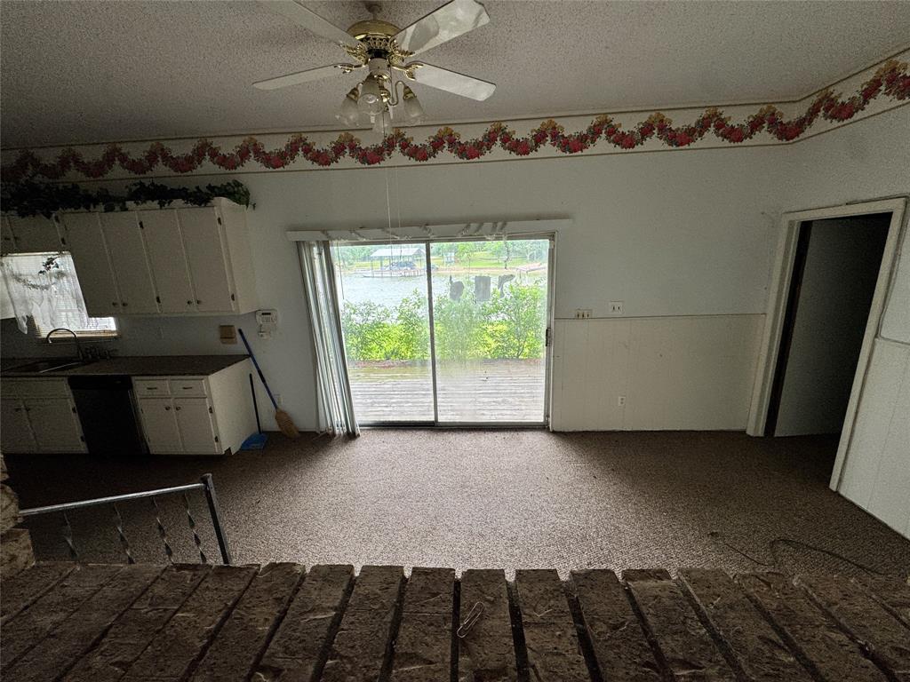 3909 Smothers Road Caney City, TX 75148 - Photo 14 of 35 a bedroom with a bed and a window