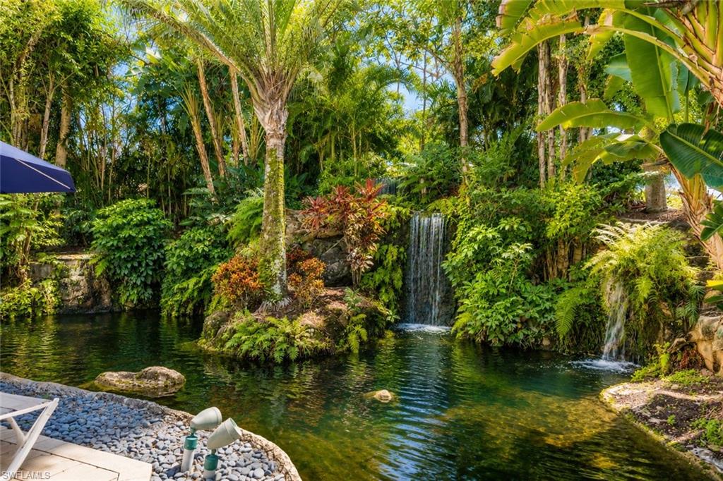600 Neapolitan Way, Unit 449 Naples, FL 34103 - Photo 38 of 44 Waterfall & garden area