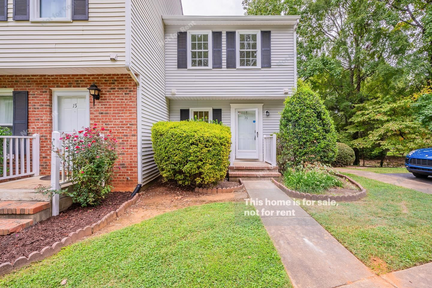 16 Quintin Place Durham, NC 27705 - Photo 1 of 19 a front view of a house with garden