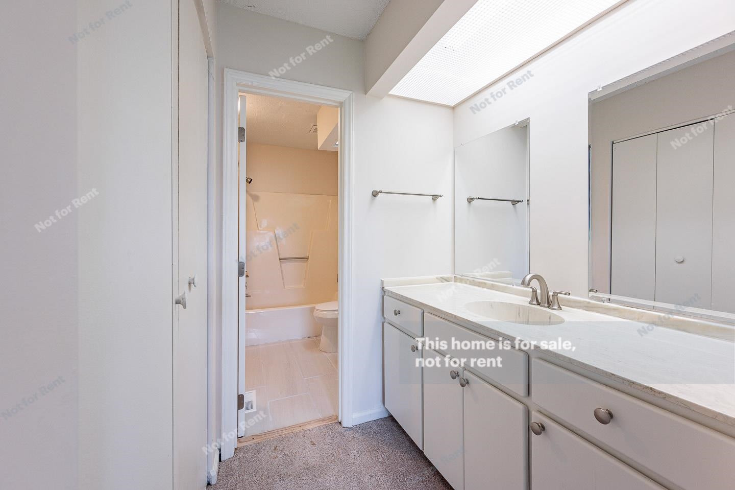 16 Quintin Place Durham, NC 27705 - Photo 12 of 19 a bathroom with a granite countertop sink two mirror and a