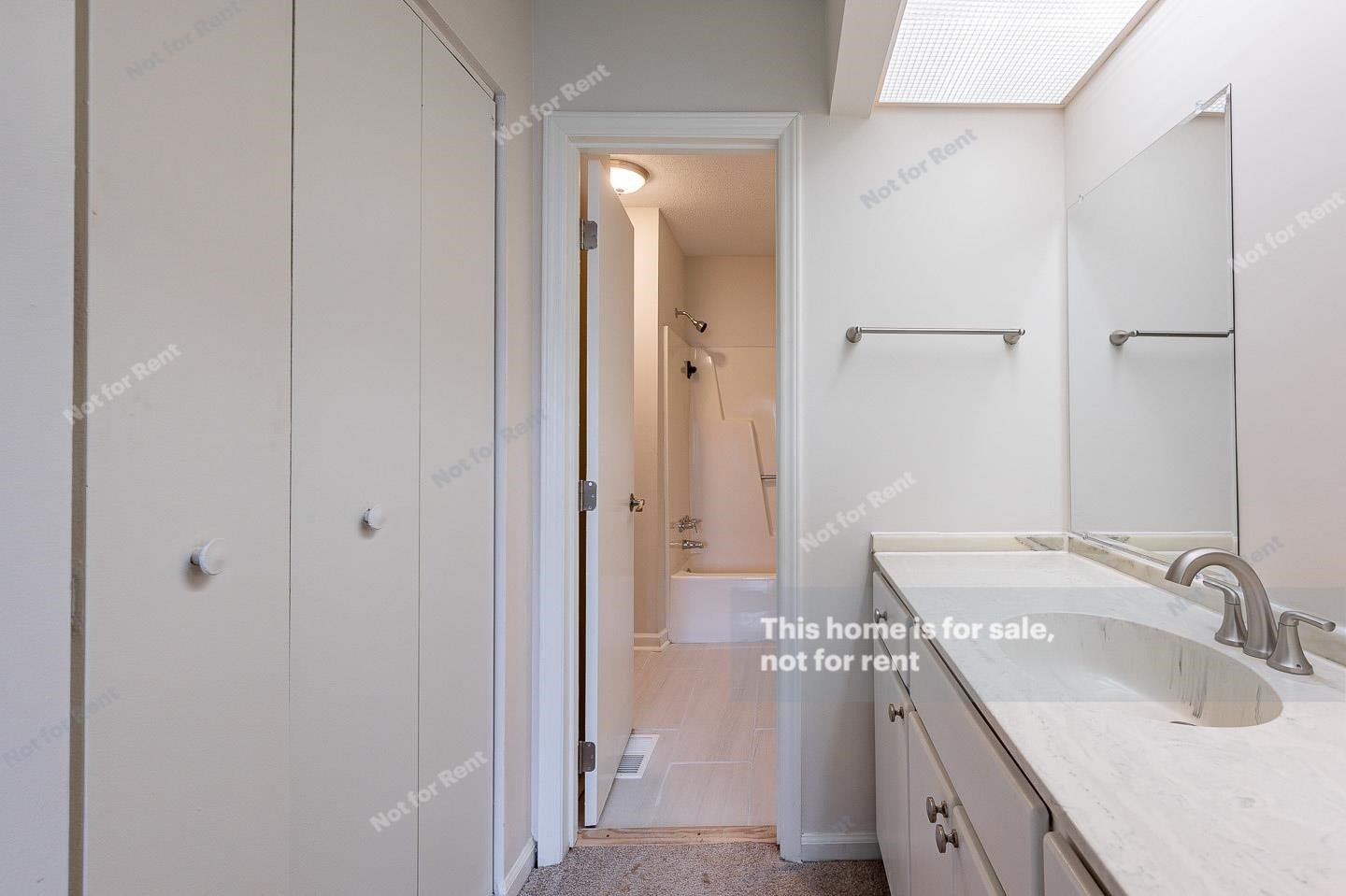 16 Quintin Place Durham, NC 27705 - Photo 13 of 19 a bathroom with a sink and a mirror