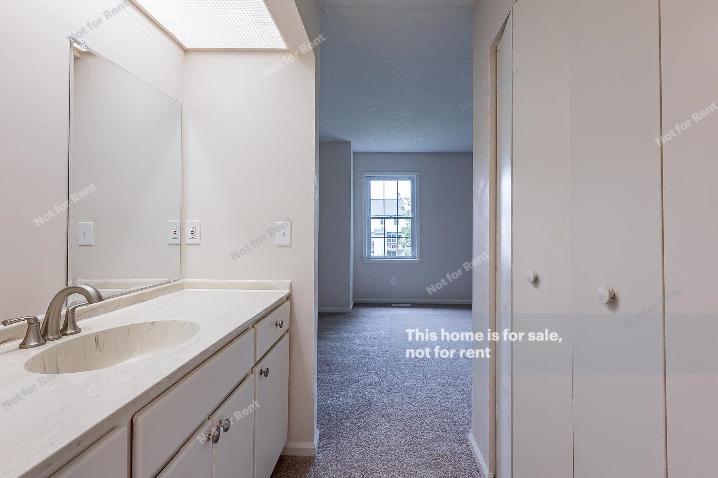 16 Quintin Place Durham, NC 27705 - Photo 14 of 19 a bathroom with a sink and a mirror