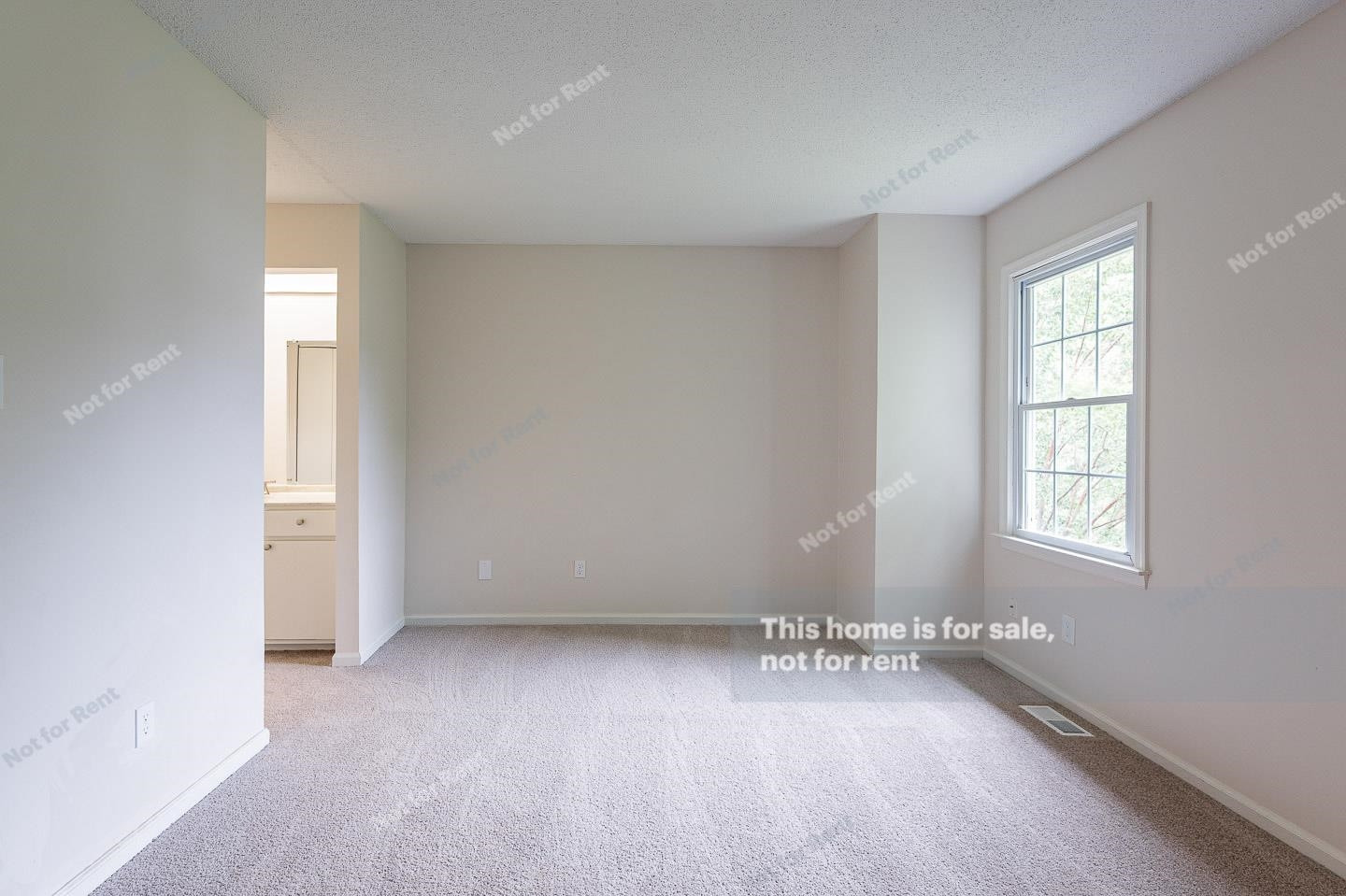 16 Quintin Place Durham, NC 27705 - Photo 5 of 19 an empty room with wooden floor and windows