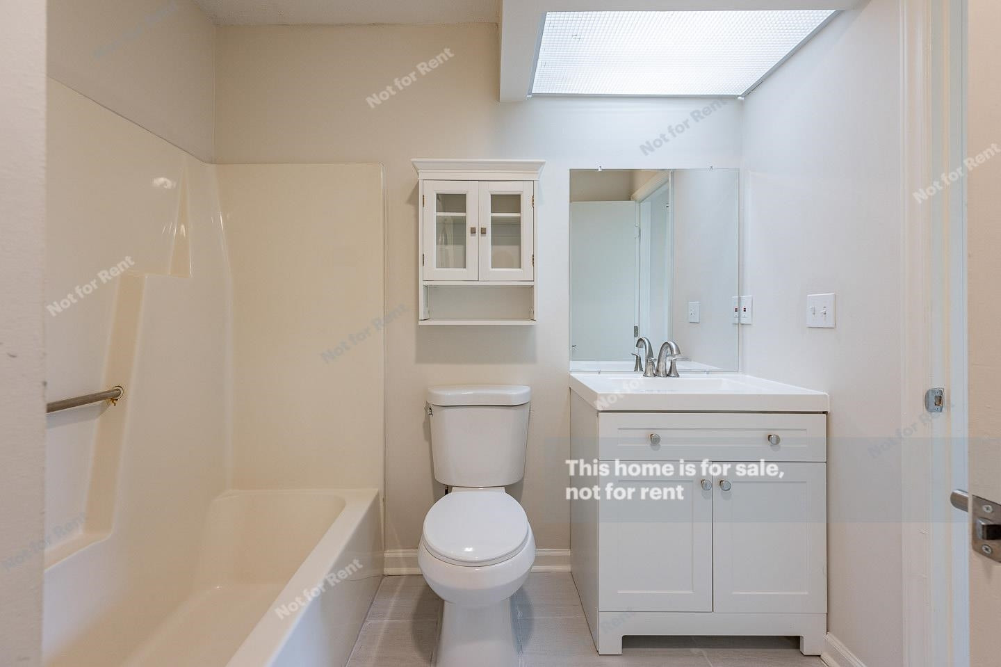 16 Quintin Place Durham, NC 27705 - Photo 7 of 19 a bathroom with a sink toilet and shower