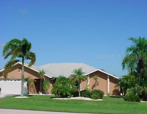25272 Derringer Road Punta Gorda, FL 33983 - Photo 1 of 1 Exterior Front - Beautifully landscaped 4 bedroom Pool home with upgrades & extras thru-out entire home! Brick Paver pool deck and entryway! Granite Kitchen with stainless steel appliances! Travertine counter tops in master bath! So much more! Heated Hot Tub too!
