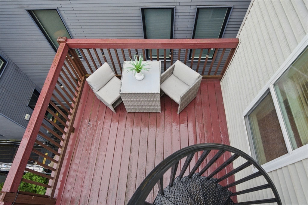 12 I Street, Unit 3 Boston, MA 02127 - Photo 14 of 19 a view of stairs and an umbrella
