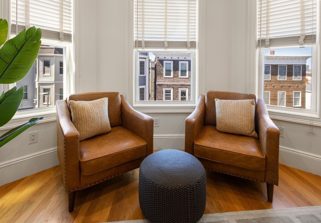 12 I Street, Unit 3 Boston, MA 02127 - Photo 10 of 19 a bedroom with furniture and a window