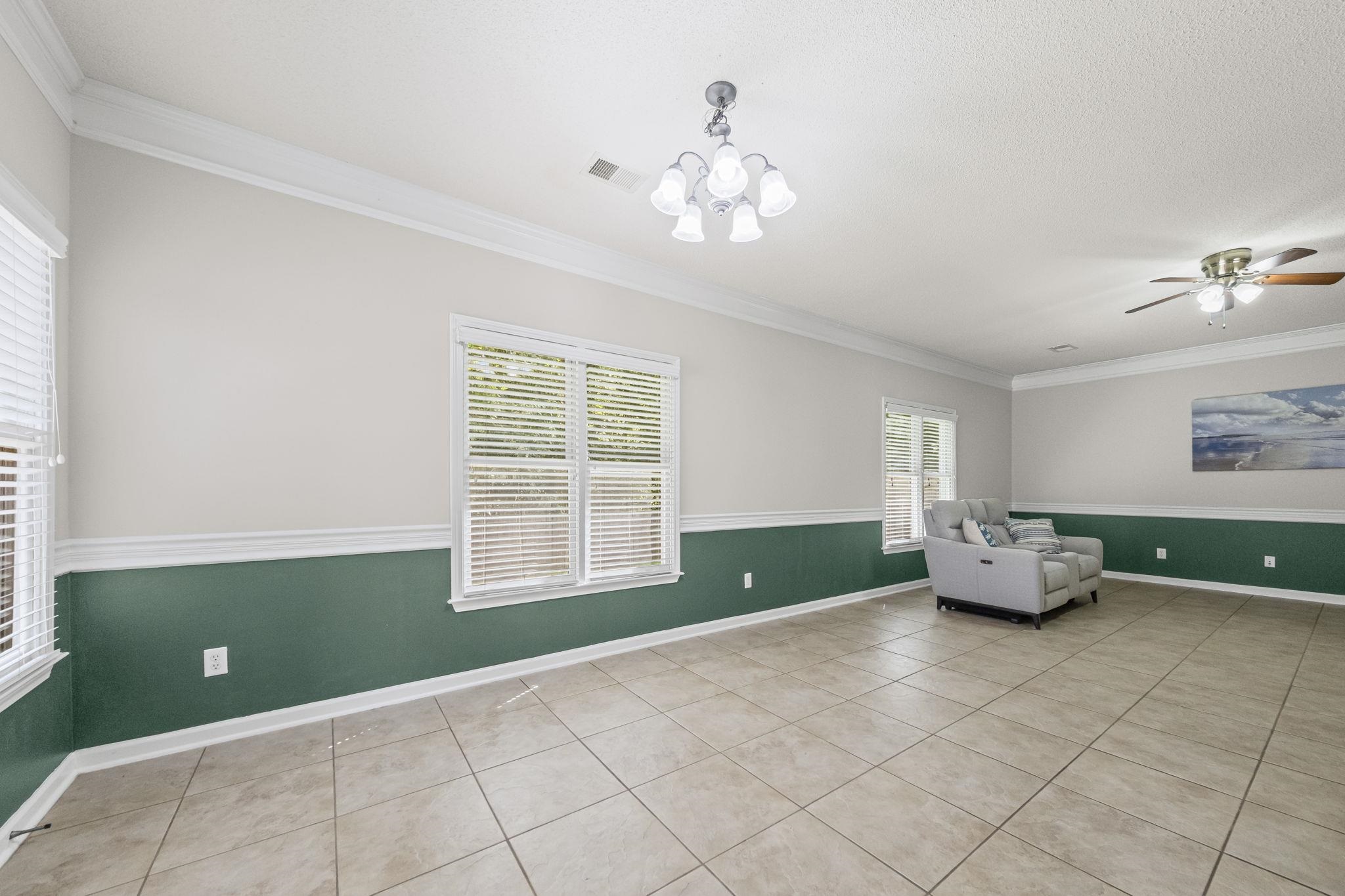 10467 Juneau Way Collierville, TN 38017 - Photo 13 of 34 a living room with furniture and a window