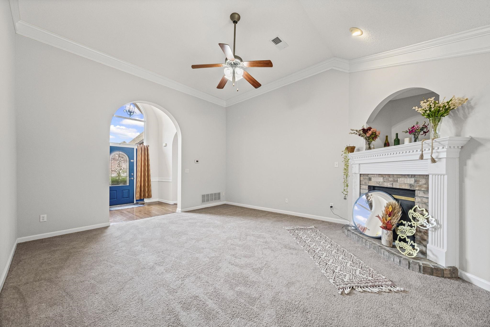 10467 Juneau Way Collierville, TN 38017 - Photo 5 of 34 wooden floor in an entryway with a chandelier