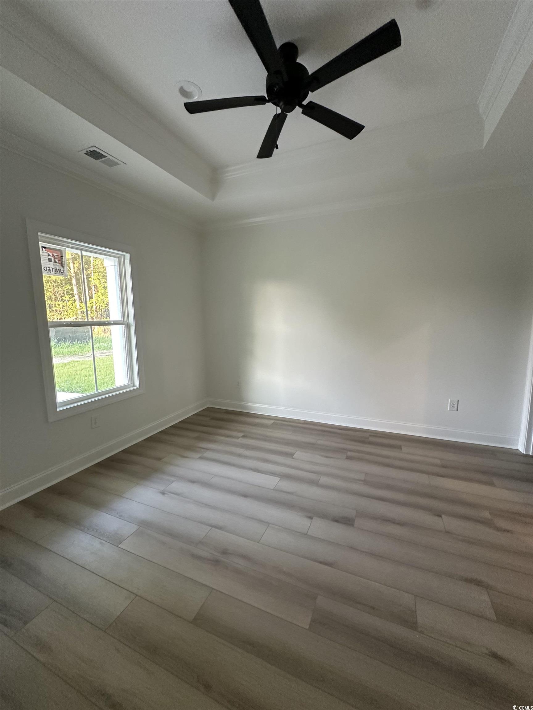 3474 Alton Road Loris, SC 29569 - Photo 11 of 16 Unfurnished room featuring crown molding, ceiling