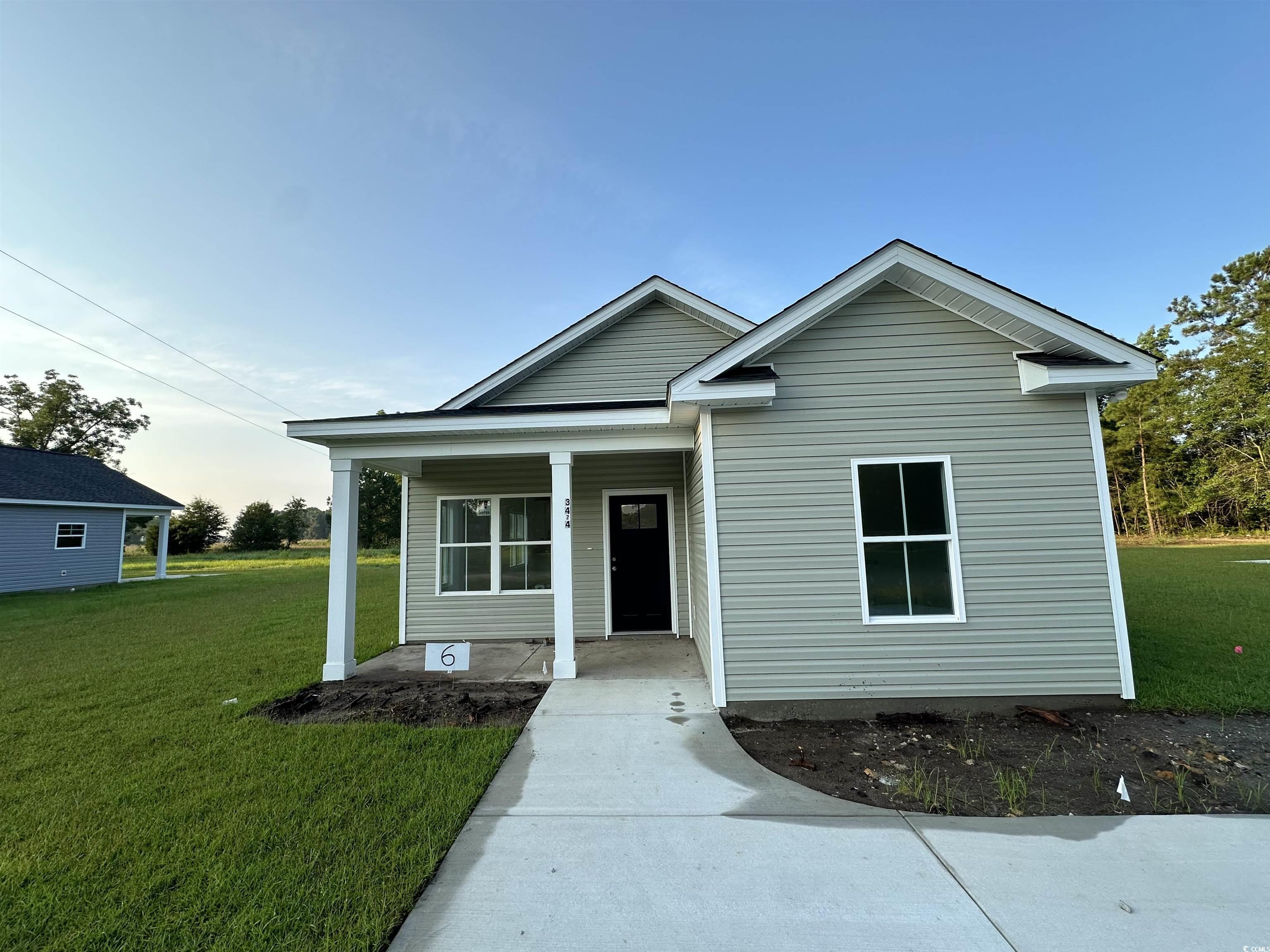 View of front of house with a front lawn
