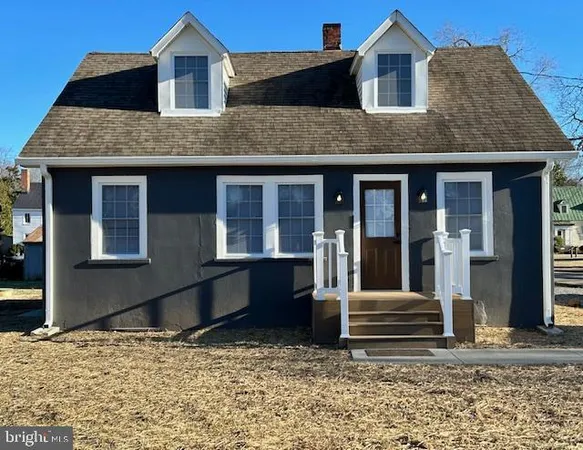 a front view of a house with glass windows