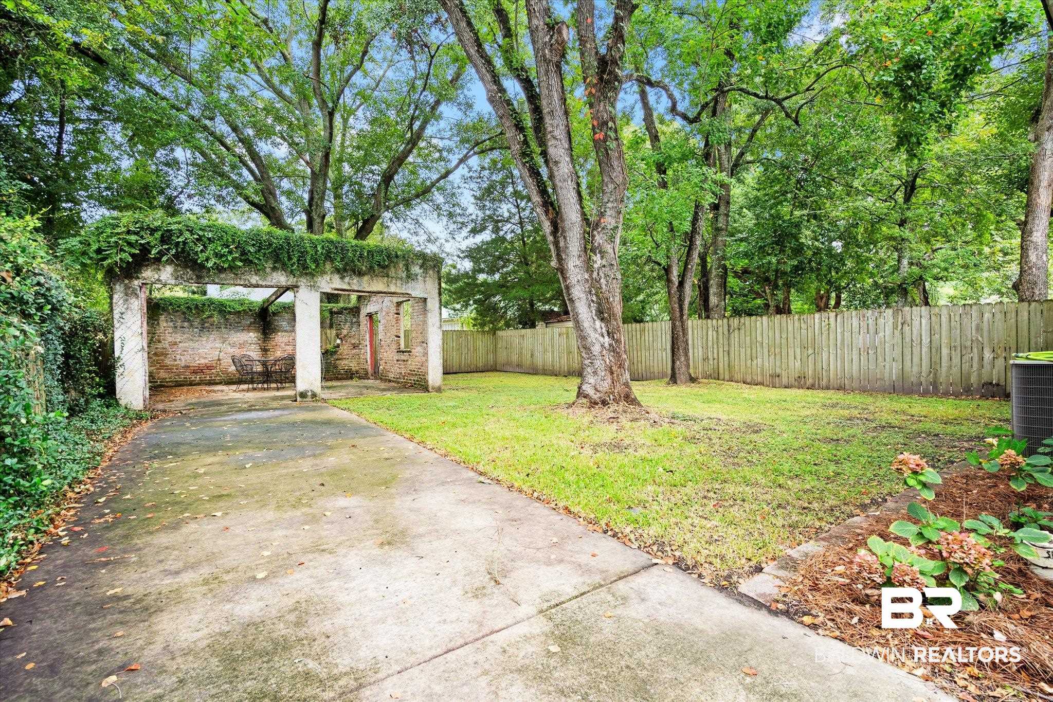 308 South Ann Street Mobile, AL 36604 - Photo 24 of 30 View of yard with central AC and a patio area