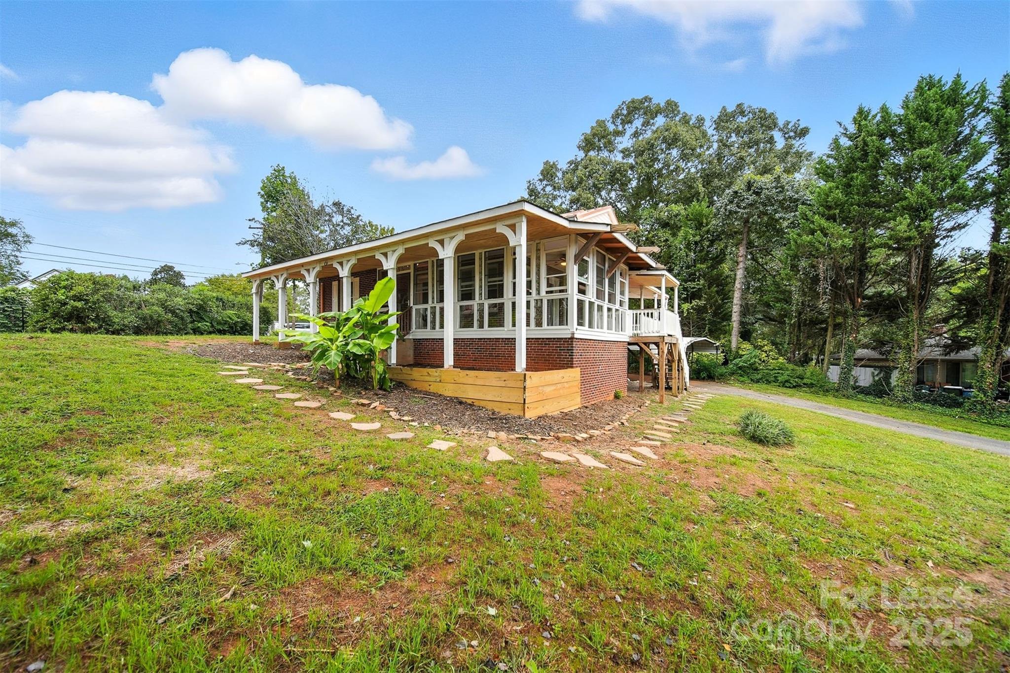 1234 11th Street Northwest Hickory, NC 28601 - Photo 18 of 19 a view of a house with a yard
