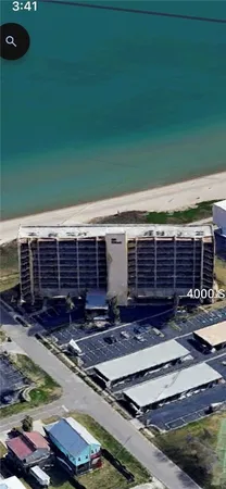 a view of backyard with seating space